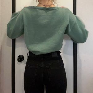 super cute cropped green sweater, size small! :)